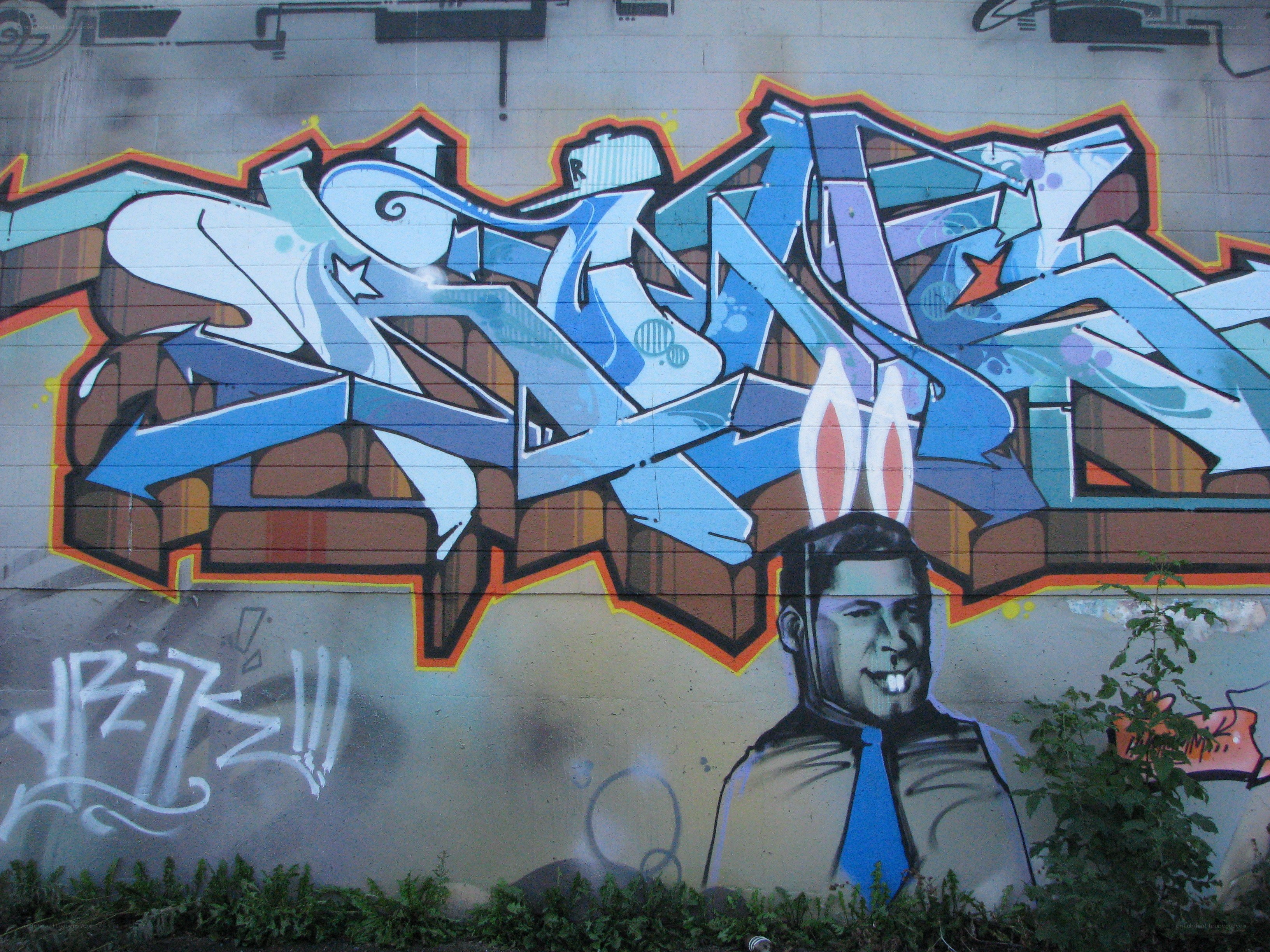 graffiti mural with bunny ears