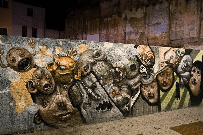 graffiti mural with faces
