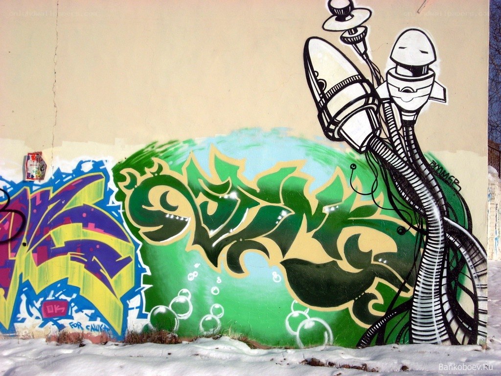 graffiti mural with robot and green letters