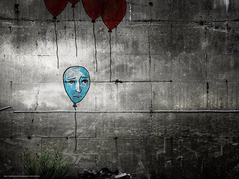 graffiti of a sad balloon face