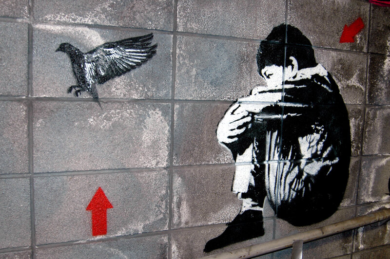 graffiti of boy and bird