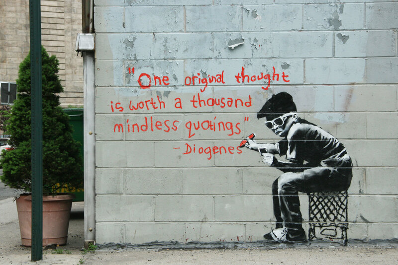 graffiti of boy quoting Diogenes