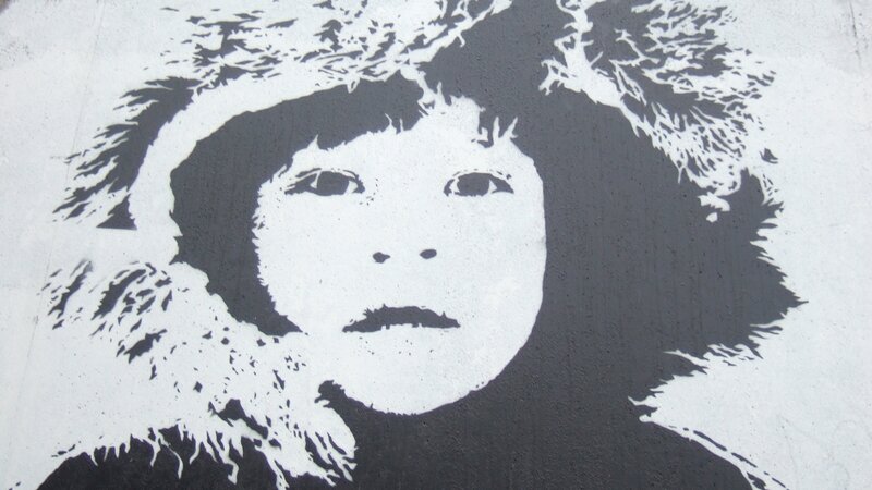 graffiti of child in parka