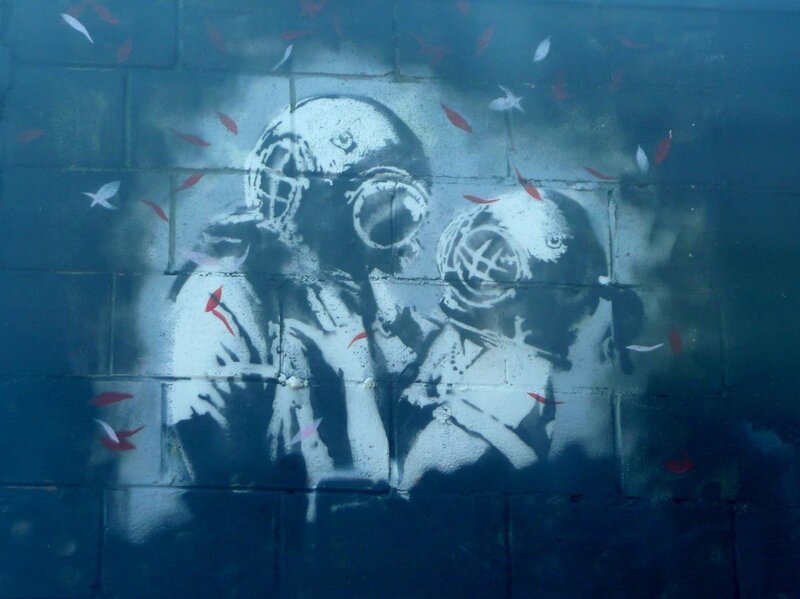 graffiti of divers underwater