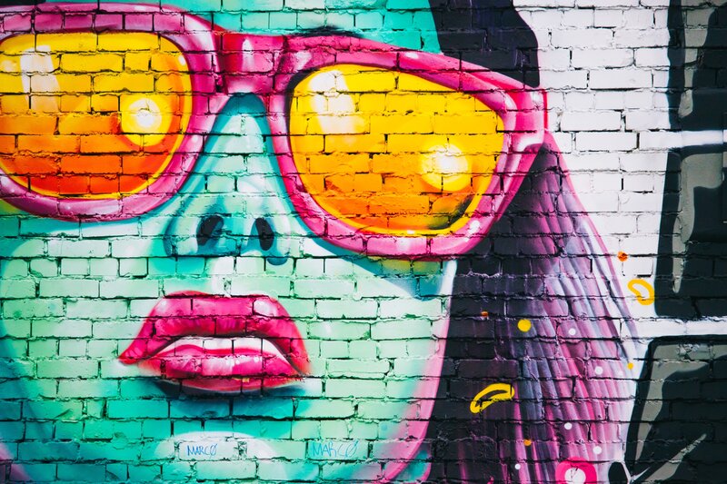 graffiti of face with sunglasses