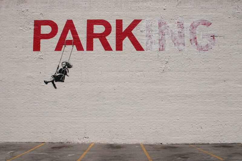 graffiti of girl on swing