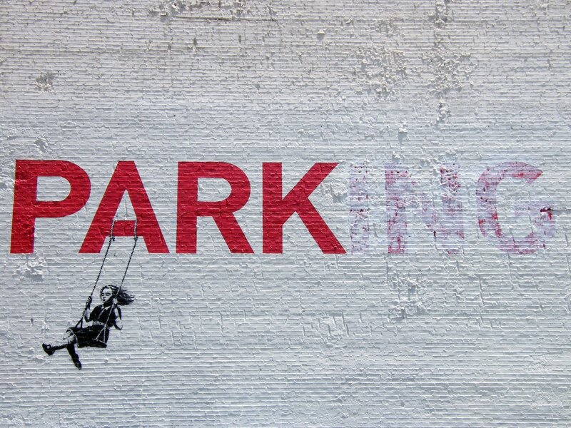 graffiti of girl on swing