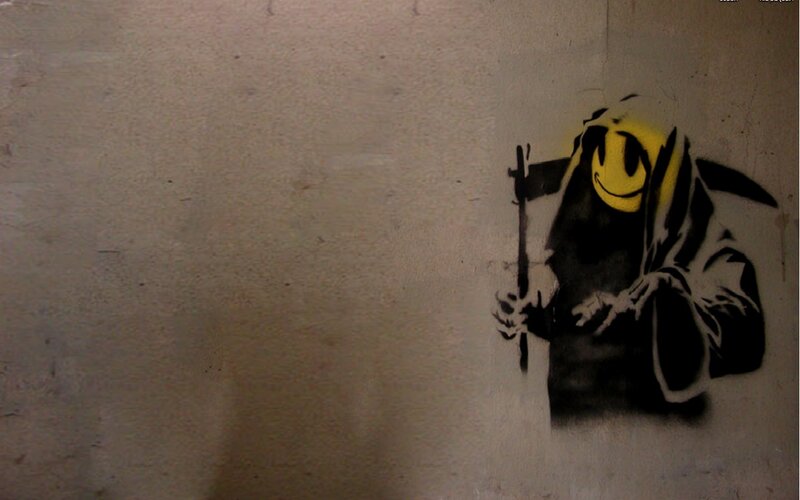 graffiti of grim reaper with smiley face