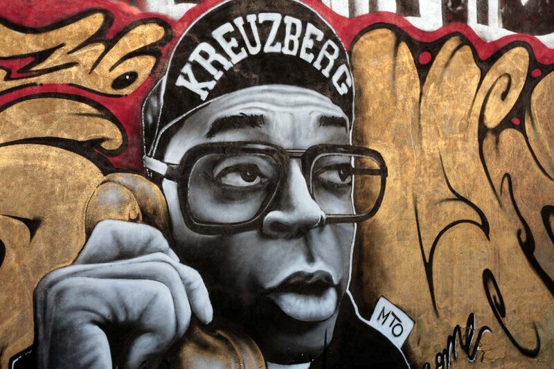 graffiti of man in cap