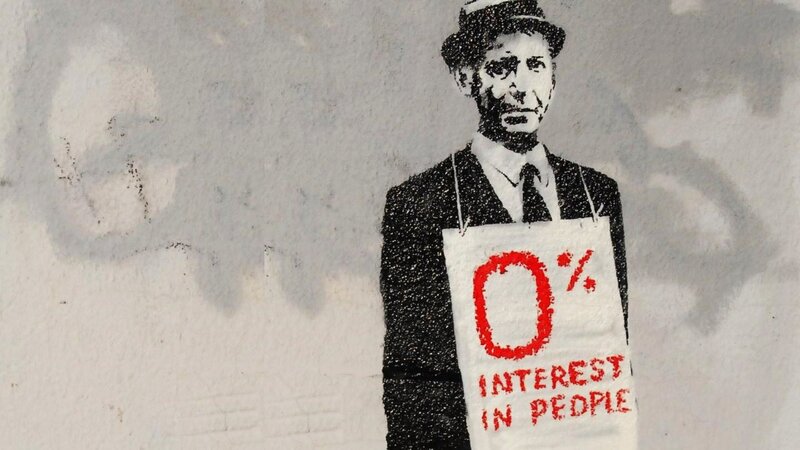 graffiti of man with sign
