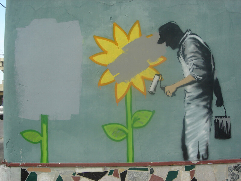 graffiti of painter with sunflower