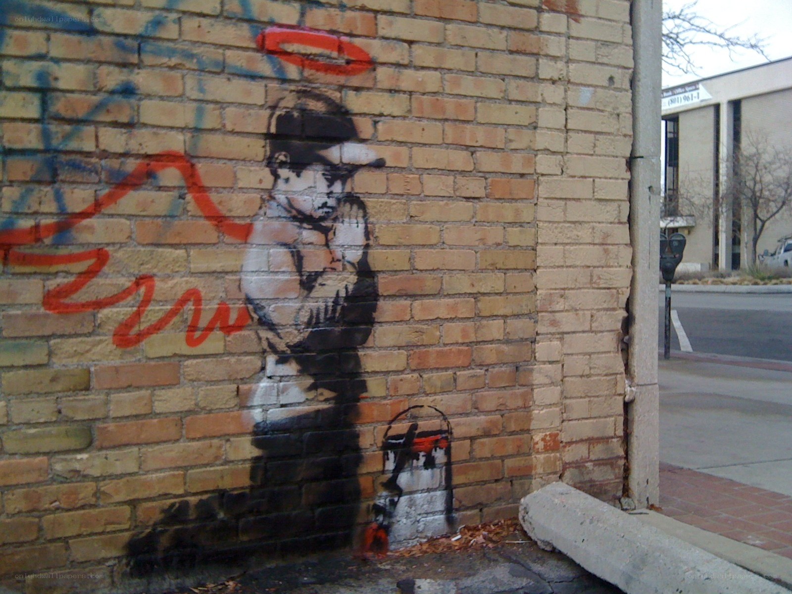 graffiti of praying boy
