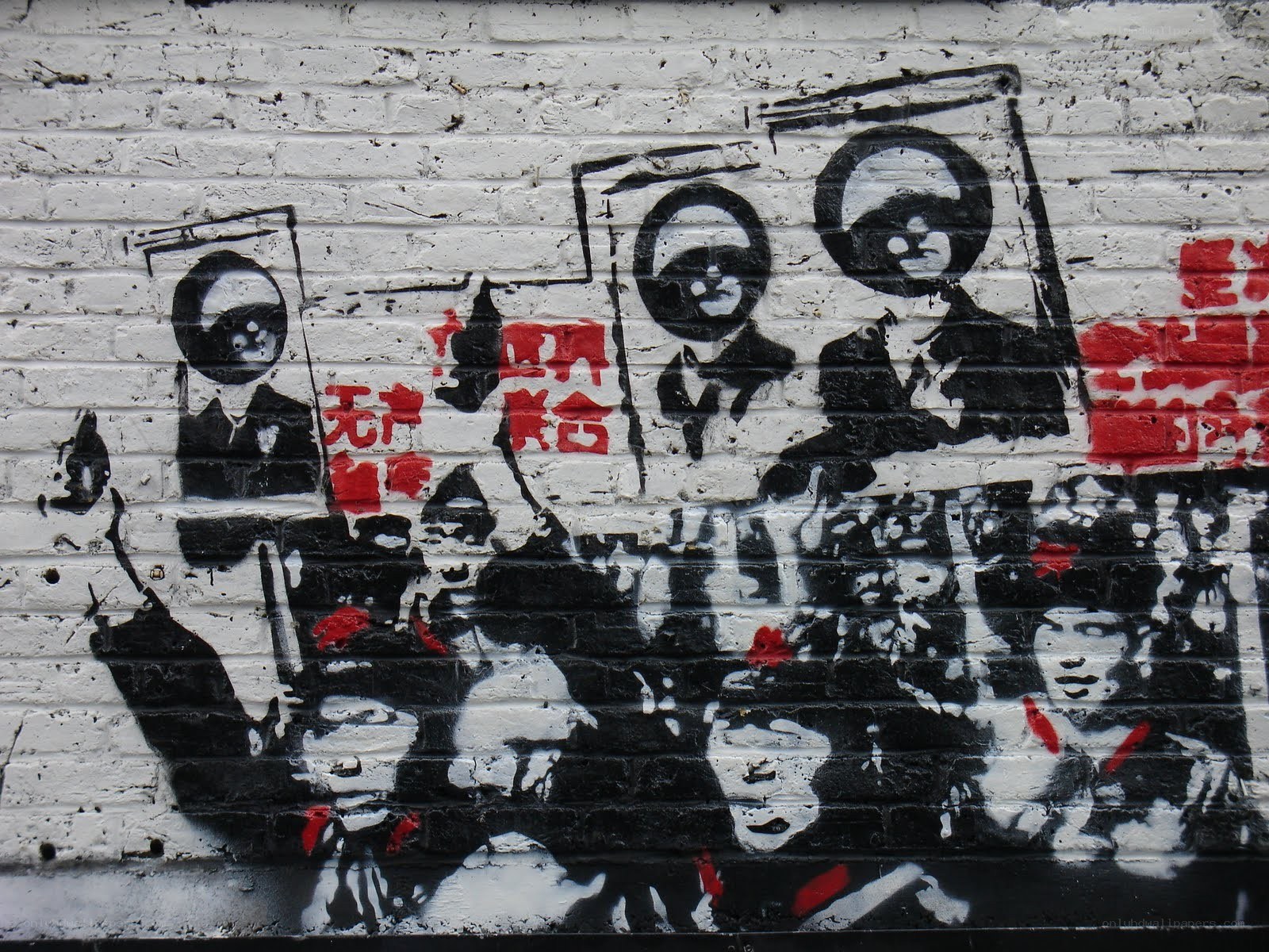 graffiti of protest figures