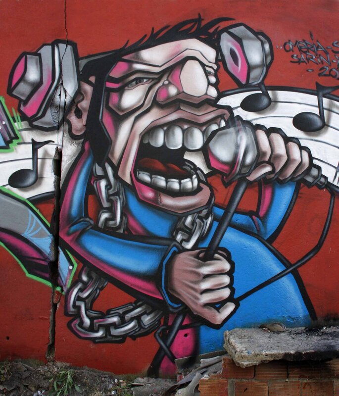 graffiti of singer with headphones
