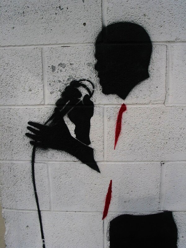 graffiti of singer with microphone