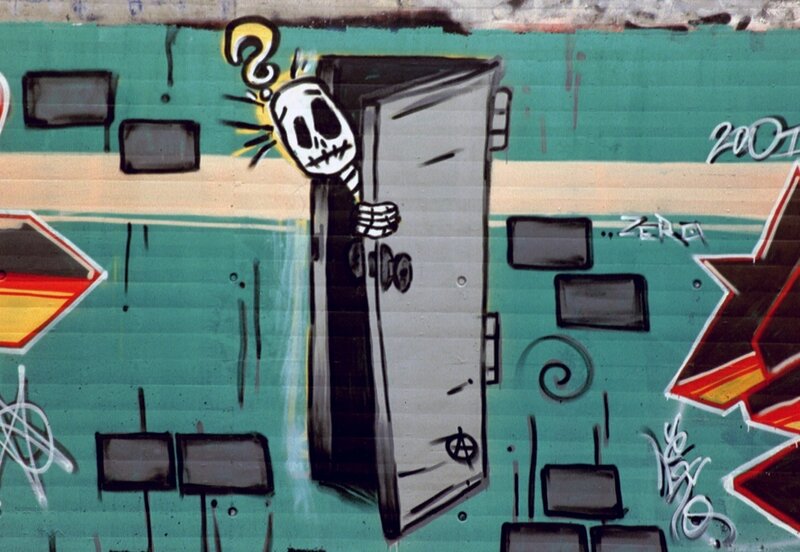 graffiti of skeleton at door