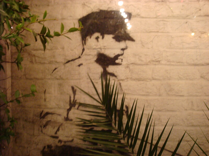 graffiti of soldier on brick wall