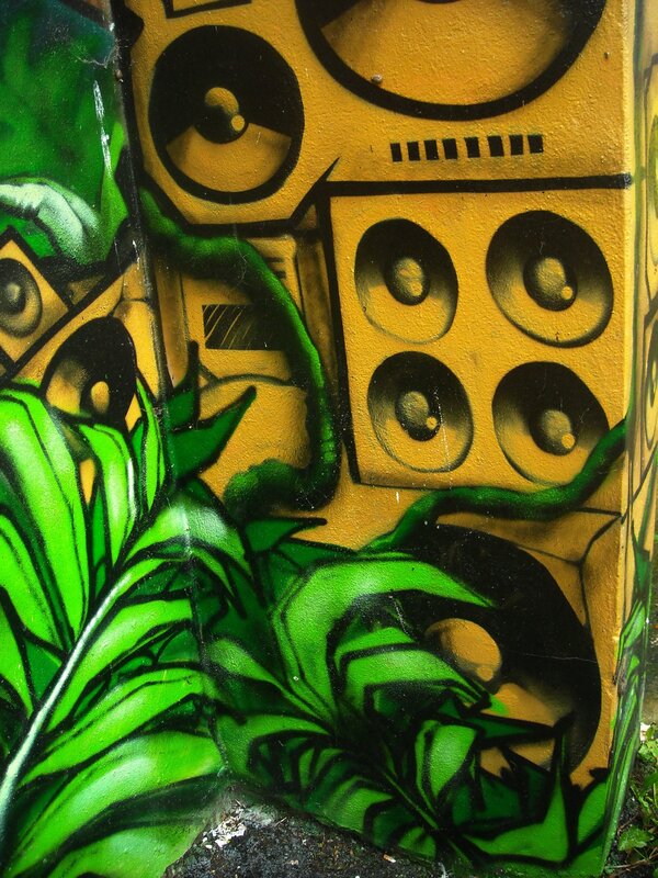 graffiti of speakers and plants