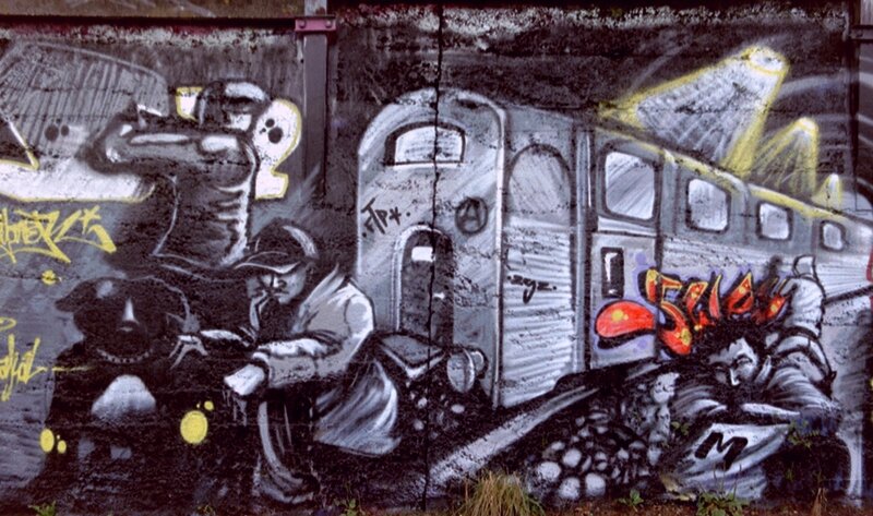 graffiti of train and figures