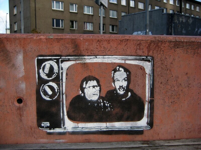 graffiti of TV with two people