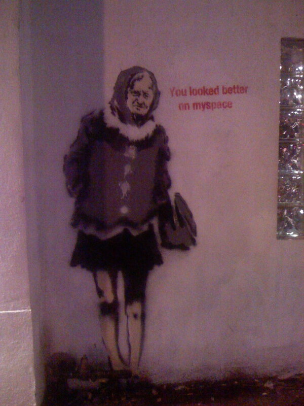 graffiti of woman with text
