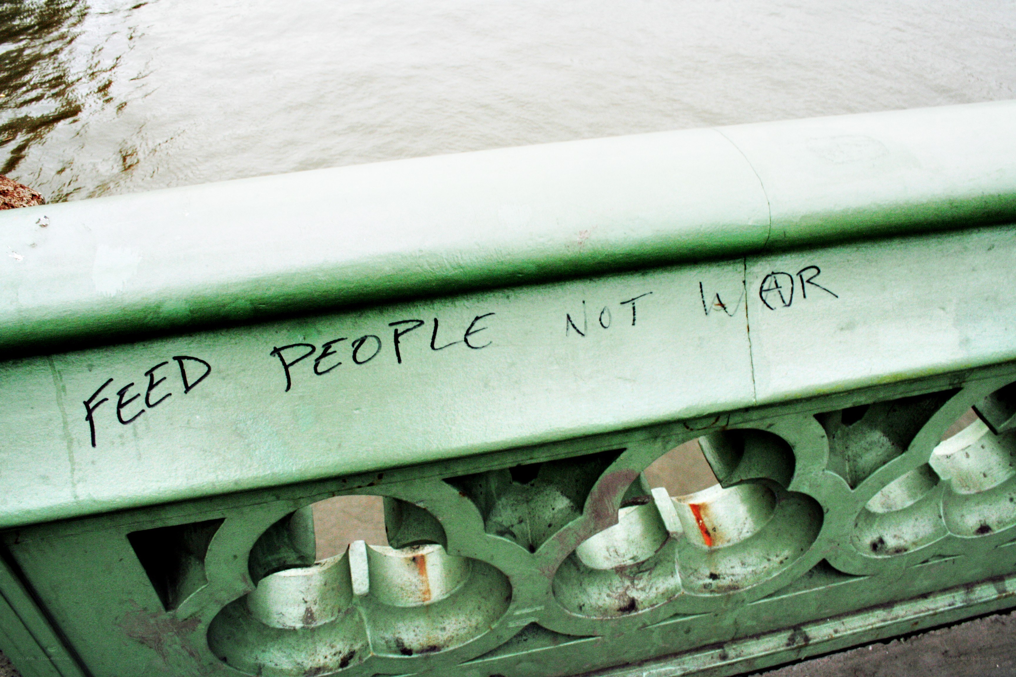 graffiti on a bridge railing