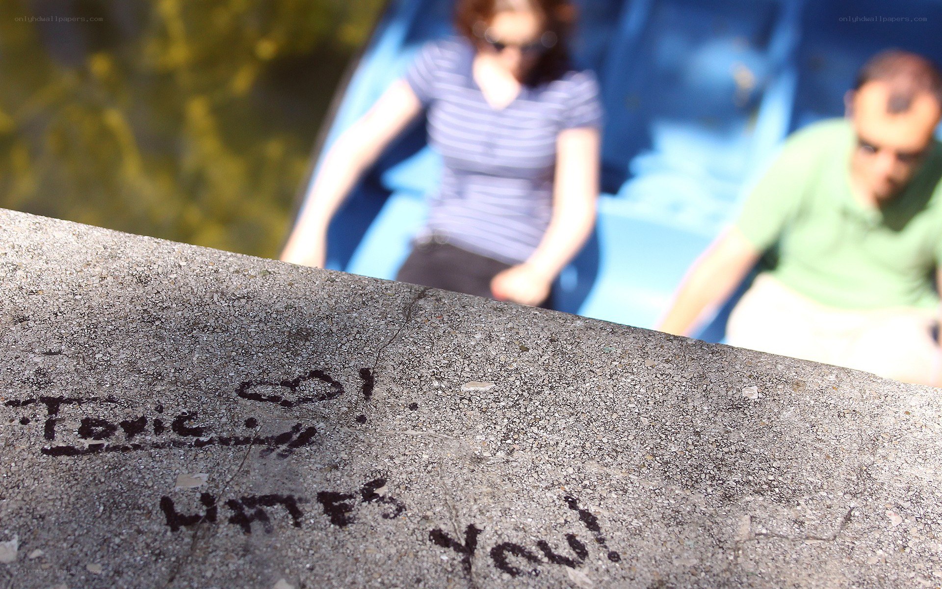 Graffiti on a concrete ledge