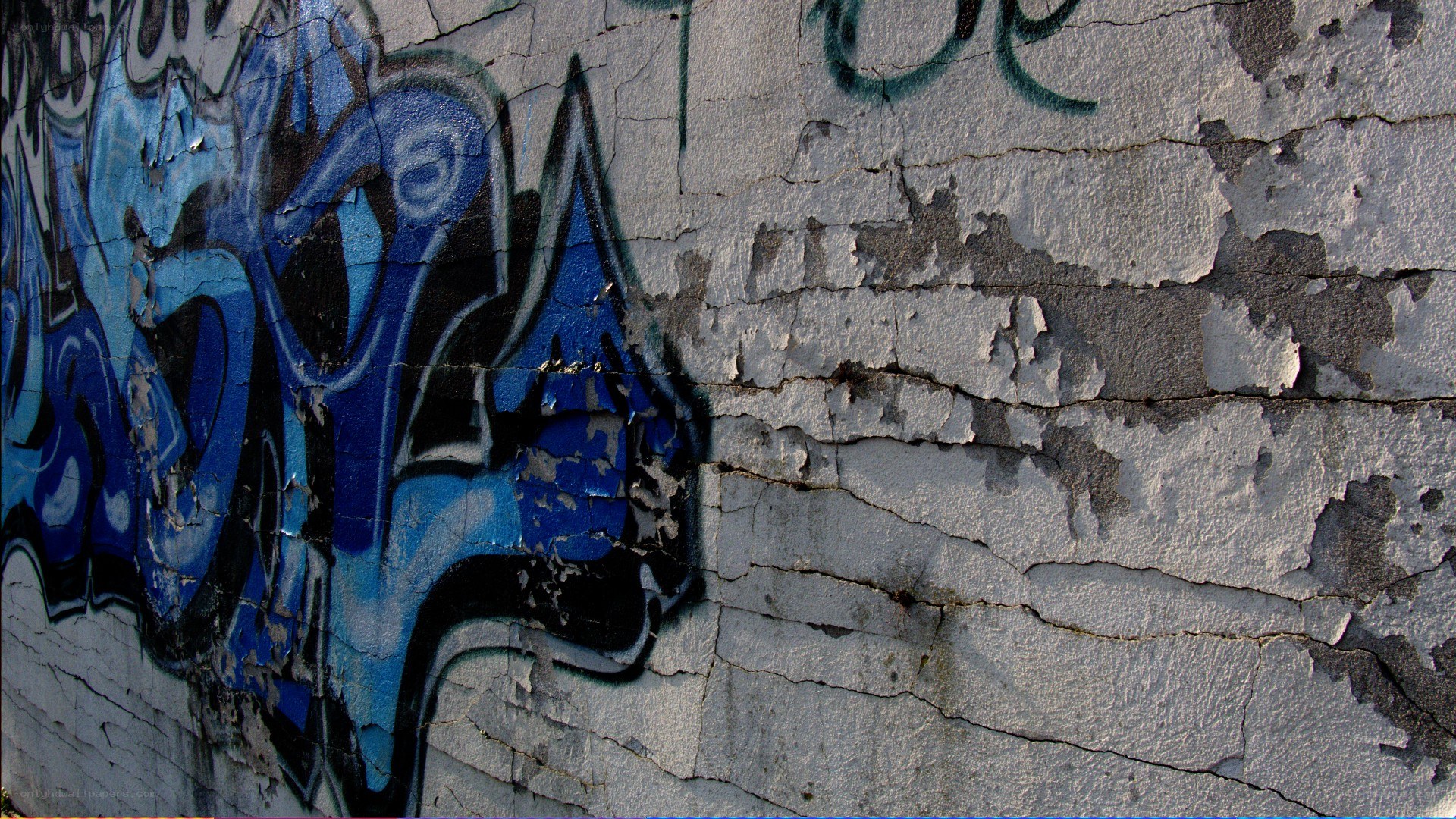 graffiti on a cracked wall