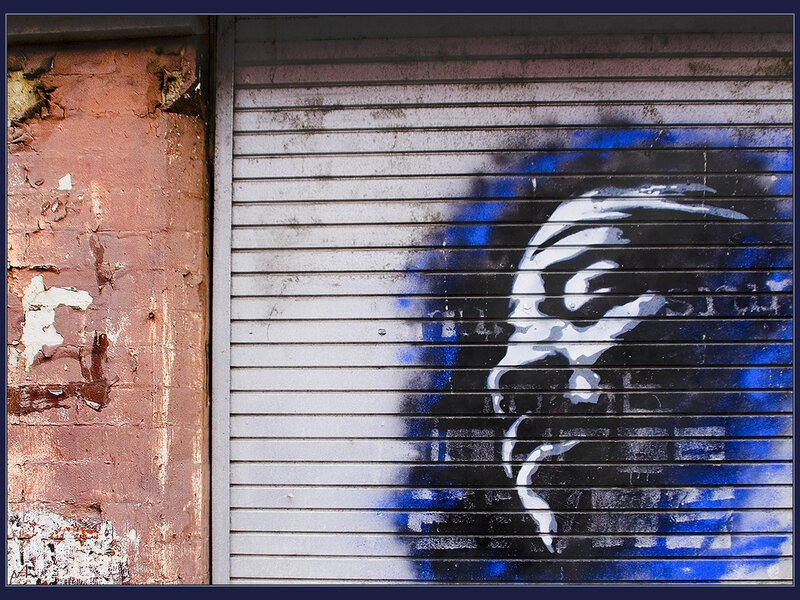 graffiti on a shuttered storefront