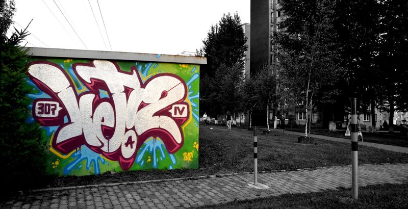 Graffiti on a Wall — Green, Urban, Afternoon