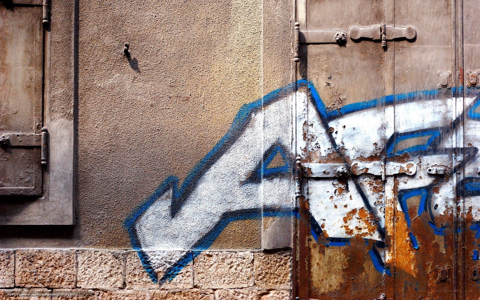 graffiti on a weathered door