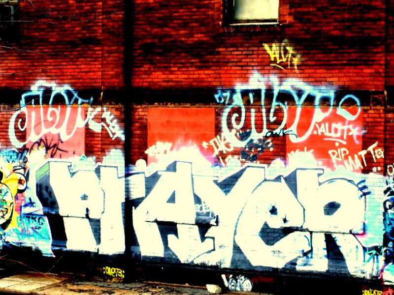 graffiti on brick wall
