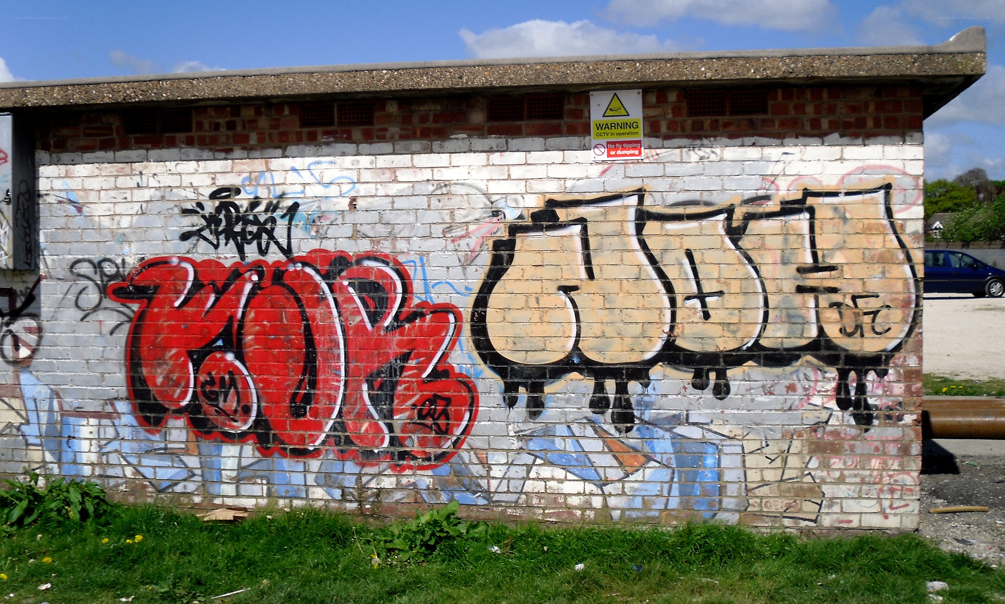 graffiti on brick wall