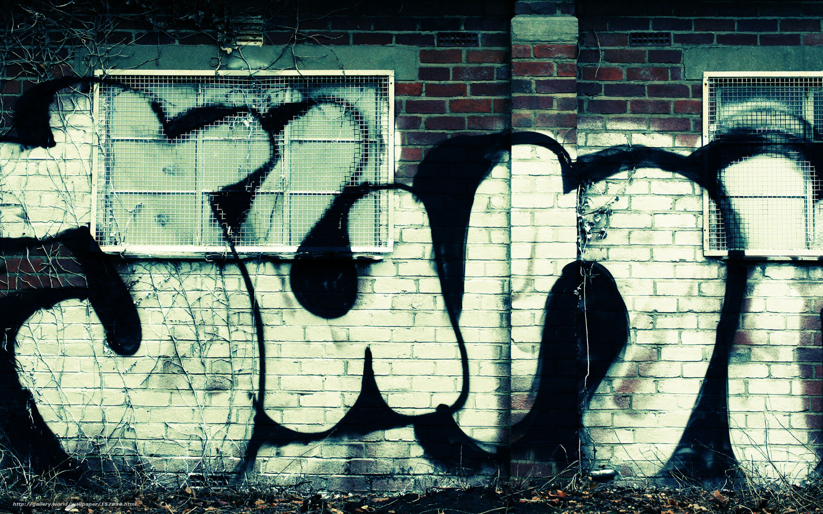 graffiti on brick wall