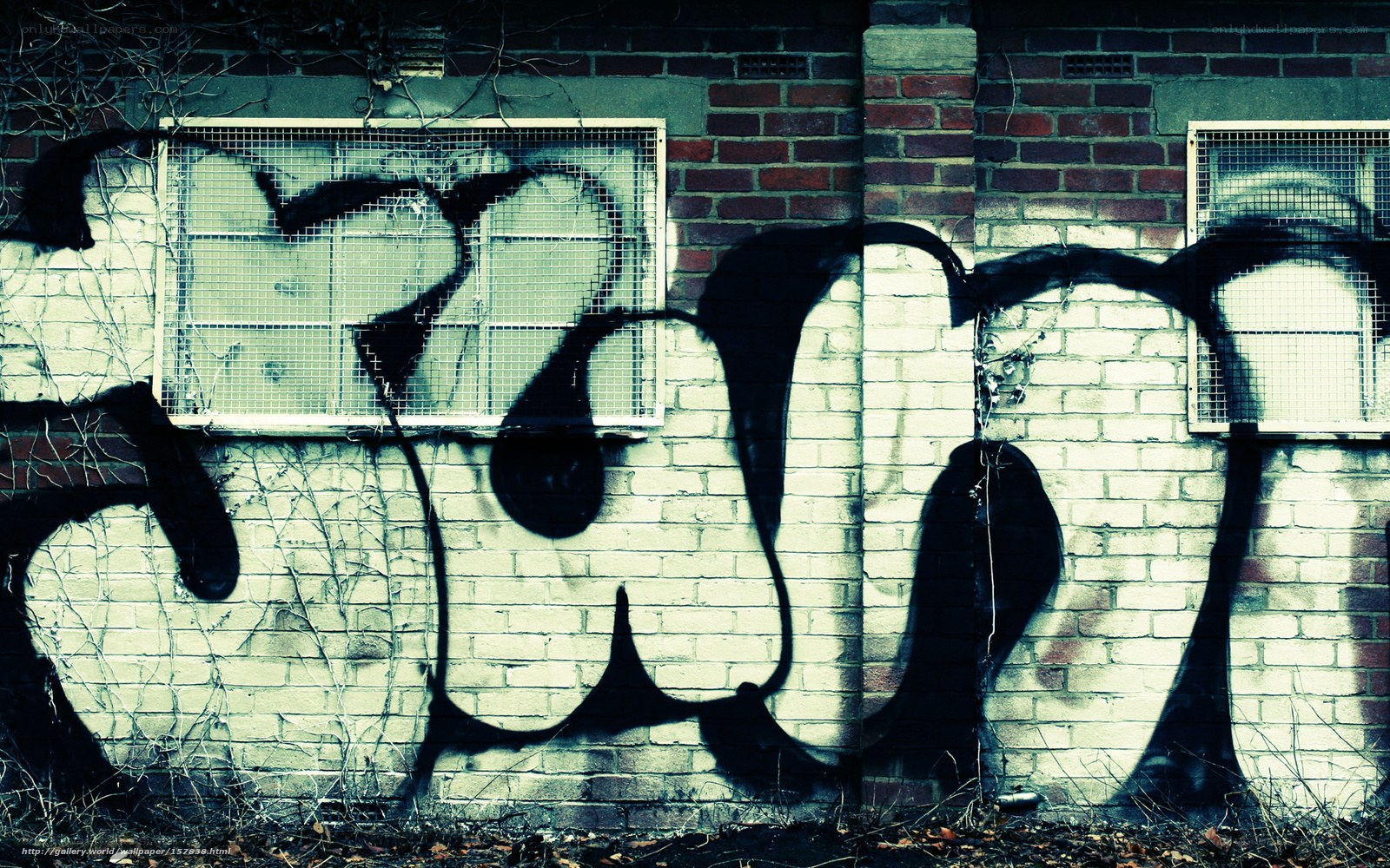 graffiti on brick wall