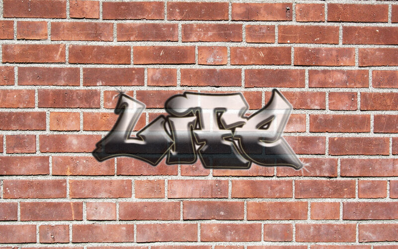 graffiti on brick wall
