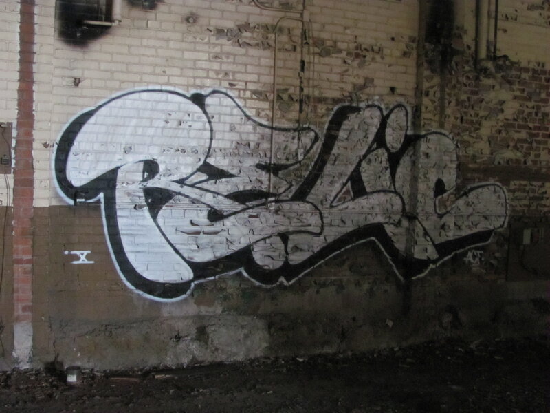 graffiti on brick wall