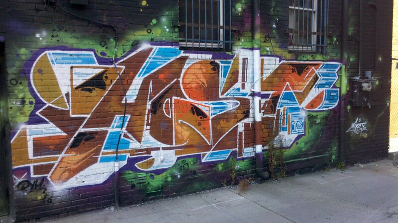 graffiti on brick wall