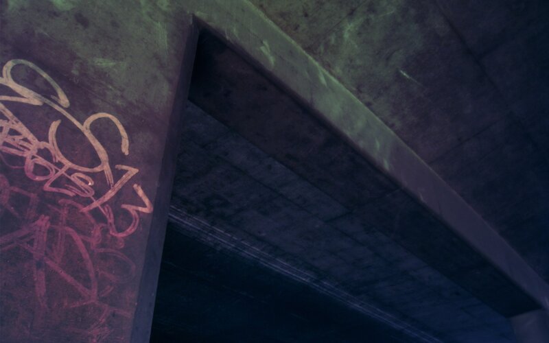 Graffiti on Concrete Pillar — Purple