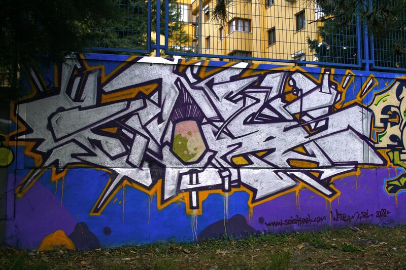 Graffiti on Concrete Wall — Blue, Urban, Afternoon