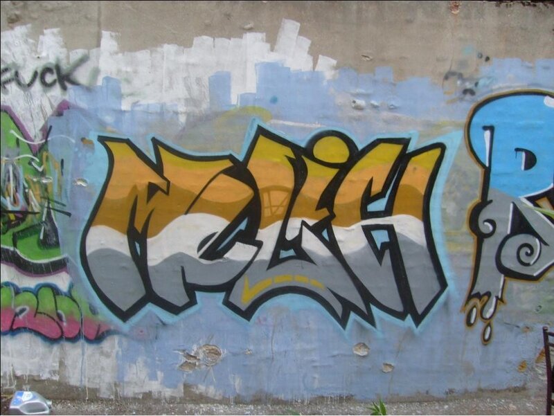 Graffiti on Concrete Wall — Blue, Urban, Photograph, Spray Paint, Letters