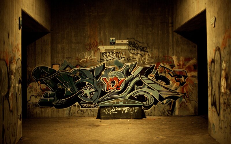 Graffiti on Concrete Wall — Brown, Dramatic