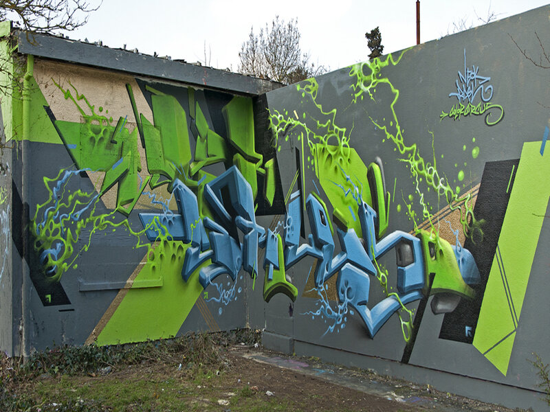 Graffiti on Concrete Wall — Green