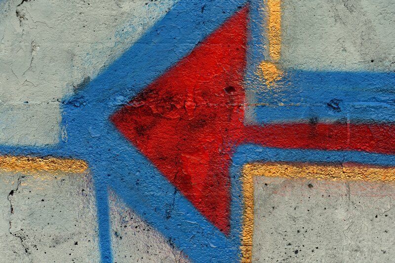 Graffiti on Concrete Wall — Red, Urban, Photograph, Red Triangle