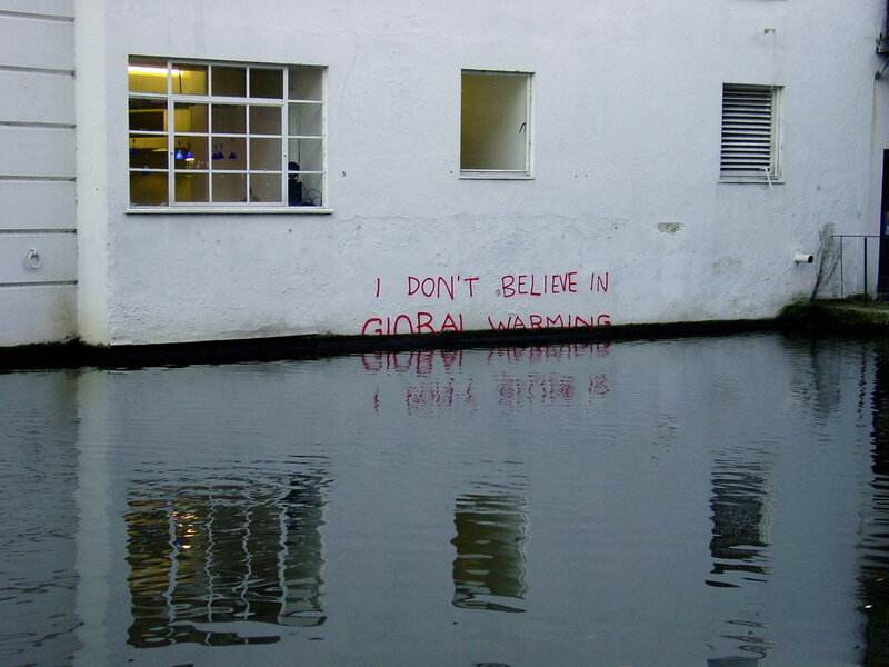 Graffiti on flooded building wall