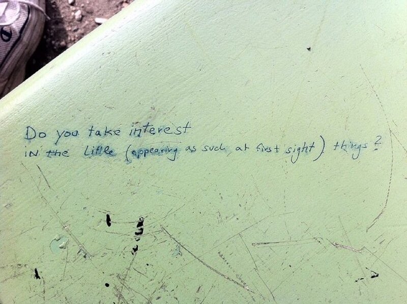 Graffiti on Green Surface