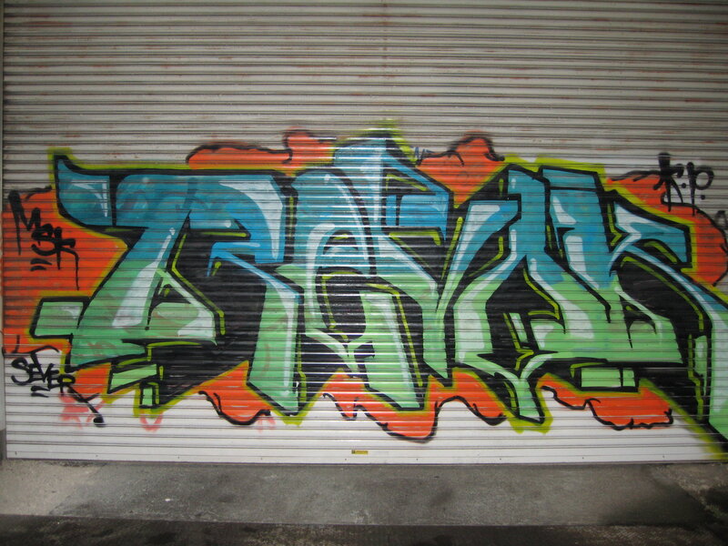 graffiti on metal shutter