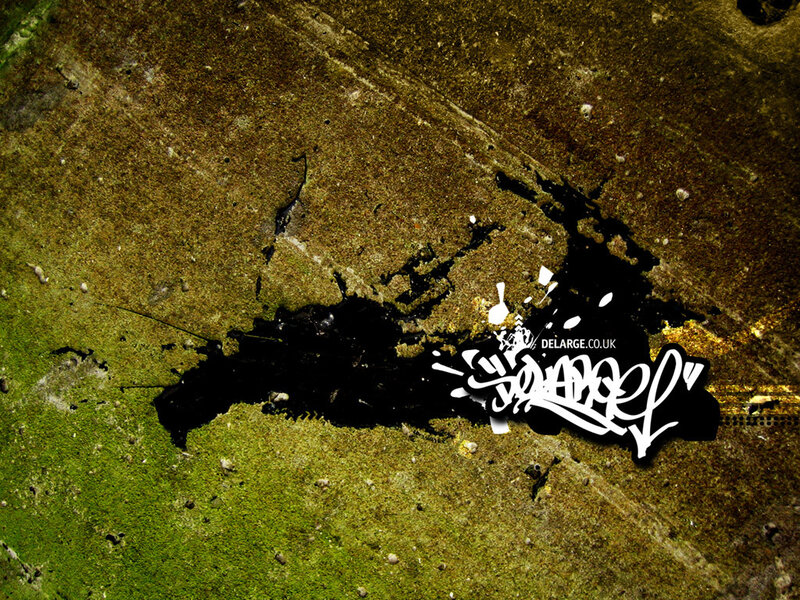 graffiti on mossy wall