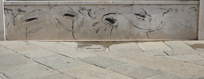 graffiti on stone wall