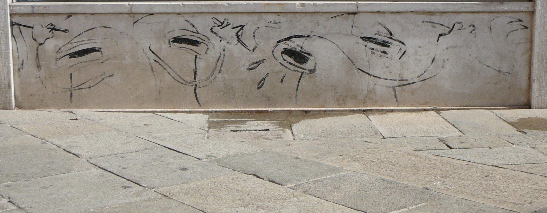 graffiti on stone wall